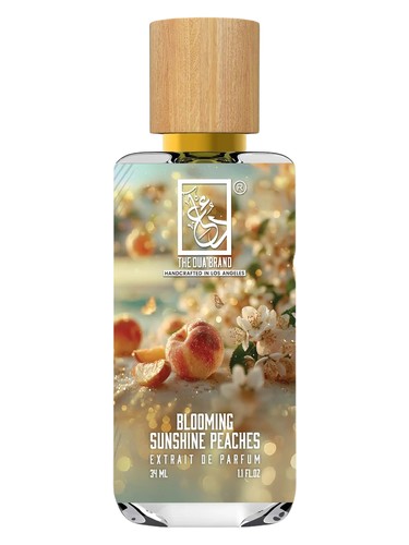 The Dua Brand Blooming Sunshine Peaches fragrance bottle