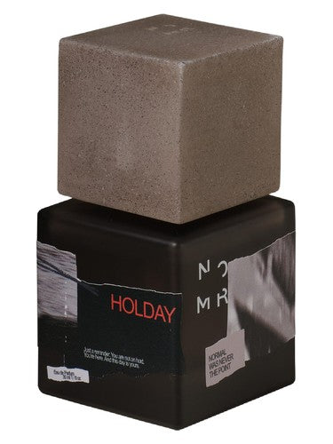 NOMR Holday fragrance bottle