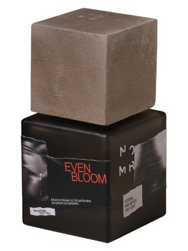 NOMR Evenbloom fragrance bottle