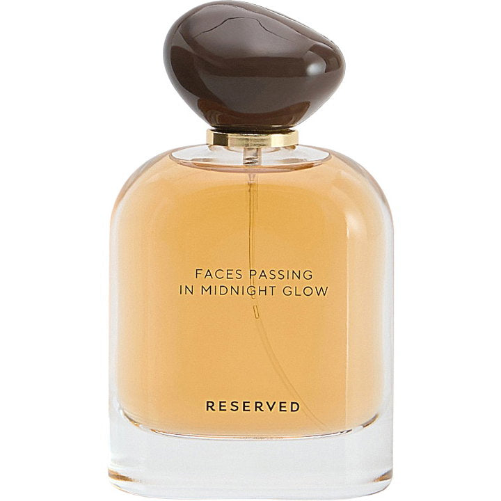 Reserved Faces Passing in Midnight Glow fragrance bottle