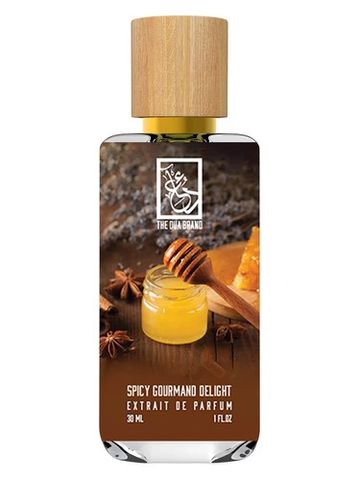 The Dua Brand Spicy Gourmand Delight fragrance bottle
