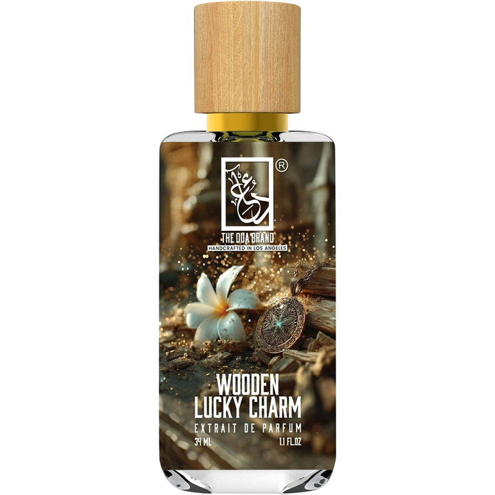 The Dua Brand Wooden Lucky Charm fragrance bottle