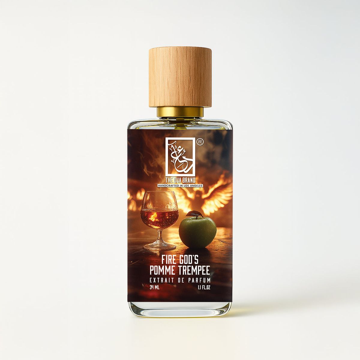 The Dua Brand Fire God's Pomme Trempee 2026 fragrance bottle