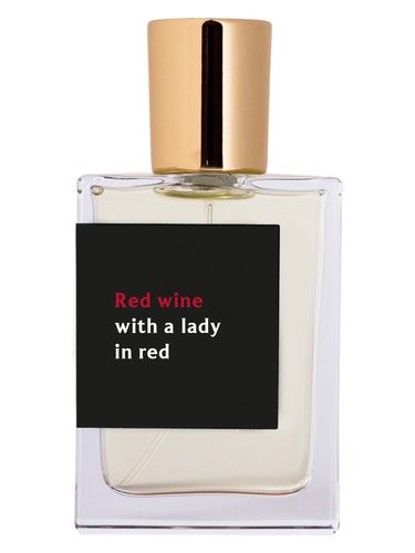 Proad Red Wine with a Lady In Red fragrance bottle